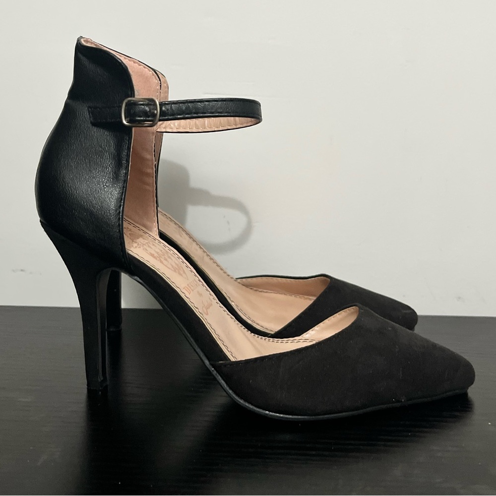 Black pointed toe high heels